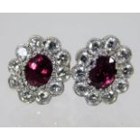 A pair of 18ct gold ruby & diamond earrings 2.6g