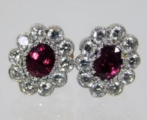 A pair of 18ct gold ruby & diamond earrings 2.6g