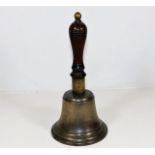 A Victorian walnut handled school bell, split to h