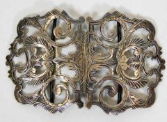 A silver nursing belt buckle by Arthur Joseph Maso