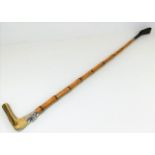 A Swaine cane riding crop with bone handle & white