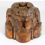 A Victorian copper jelly mould 4.375in high