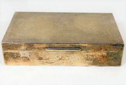 An inscribed silver tobacco box presented to Wilfr