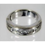 A 9ct white gold ring set with five diamonds of ap