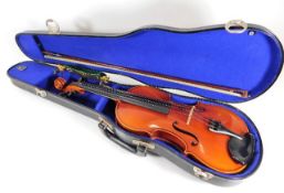 A violin & case inscribed Aubert A. Mirecourt to bridge 23.5in long