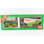 A boxed diecast Claas Lexion 480 Combine harvester