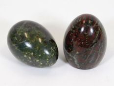 Two large polished serpentine eggs