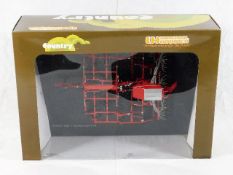 A Universal Hobbies boxed diecast agricultural far