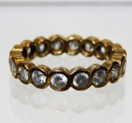 A 9ct gold CZ eternity ring 3.1g size L