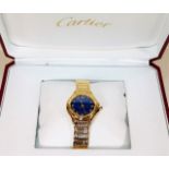 A fine ladies Cartier 18ct gold quartz blue dial w