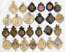 A collection of 26 early 20thC. cricket medals inc