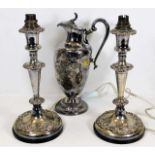 A pair of Victorian silver plated candlesticks 11.
