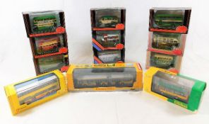 Twelve boxed diecast buses & coaches including Cor
