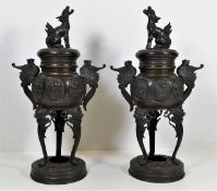 A pair of Chinese censers on stands with decorativ