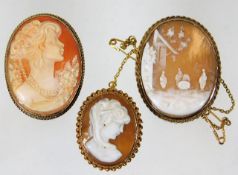 Two 9ct gold mounted cameos & one 18ct