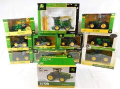 Eleven boxed Universal Hobbies diecast tractor & o