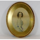 A gilt framed oval watercolor of young woman in pe