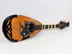 A c.1910 Naples mandolin inlaid with mother of pe