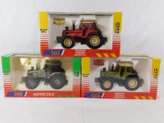 Three boxed diecast Jouef tractor models