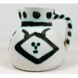 A 1956 Pablo Picasso (1881-1973), Têtes A.R. 368, Madoura pottery pitcher, limited edition of 500 ap