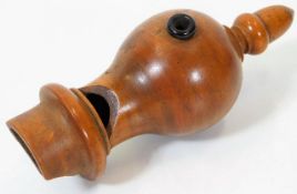 A 19thC. walnut treen pigeon whistle