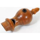 A 19thC. walnut treen pigeon whistle