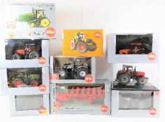 Ten boxed Siku diecast tractors & agricultural veh