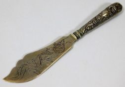 A Chinese hallmarked silver knife with embossed ha