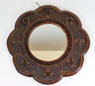 A decorative carved mirror 16.5in