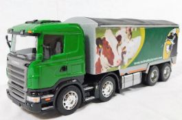 An unboxed Mole Valley Farmers lorry