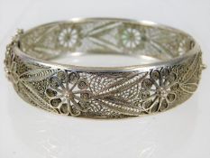 A good quality rhodium plated silver filigree work