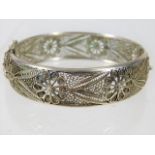 A good quality rhodium plated silver filigree work