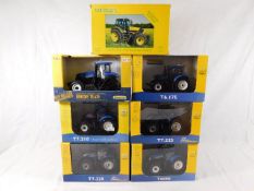 Seven boxed New Holland & Universal Hobbies diecas