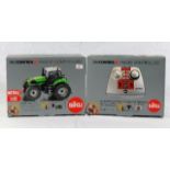 A boxed Siku radio controlled tractor with control