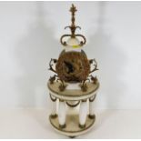 A decorative alabaster clock with gilt fittings 23
