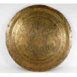 A large 19thC. Asian brass tray with elephant & sa