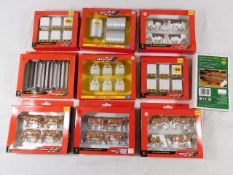 Nine boxed Britains farm animal & accessory models