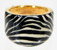 A 21ct gold ring with zebra print enamelled decor