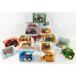 Sixteen boxed Ertl diecast tractor & other agricul