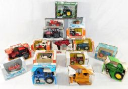 Sixteen boxed Ertl diecast tractor & other agricul