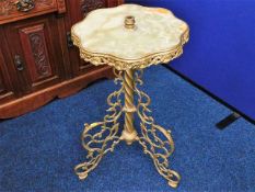 An ornate brass & onyx lamp base 30in high