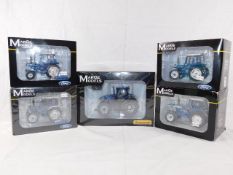 Five boxed diecast Marge tractor models including