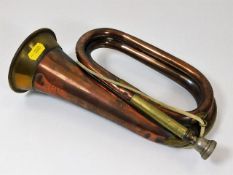 An early 20thC. Henry Potter copper & brass bugle