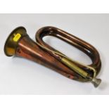 An early 20thC. Henry Potter copper & brass bugle