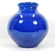 A large Barum Ware blue vase 10.25in tall x 10in w
