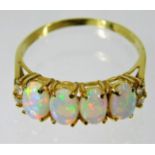 An 18ct gold ring set with diamond & opal 2.6g siz