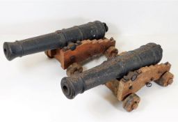 A large pair of oak mounted cannons, approx. 16in