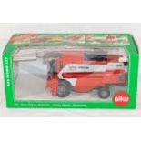 A boxed diecast Massey Ferguson Cerea 7278 combine