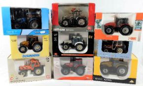 Nine mixed boxed diecast tractors & agricultural v