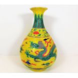 A Chinese porcelain baluster vase with dragon chas